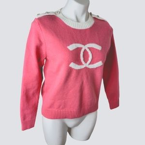Pink sweater with beautiful crystal's on shoulder. No brand thick and warm